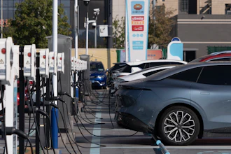 Electric vehicle charging stations are seen in Beijing, Friday, Oct. 11, 2024.