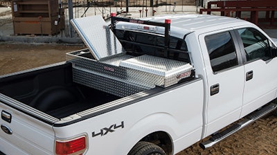 A Weather Guard storage container mounted onto a truck.