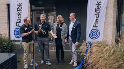 From left, Matt Gross, CEO of FlackTek; Dale Flackett, founder of FlackTek; Claudia Karst; and Andrea Ferrari.