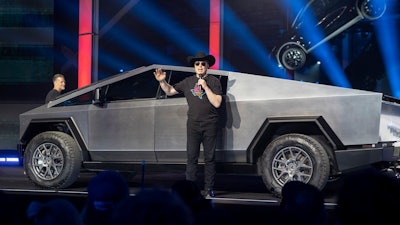 Tesla CEO Elon Musk speaks at the 'Cyber Rodeo' grand opening celebration for the new $1.1 billion Tesla Giga Texas manufacturing facility in Austin, Texas, on April 7, 2022.