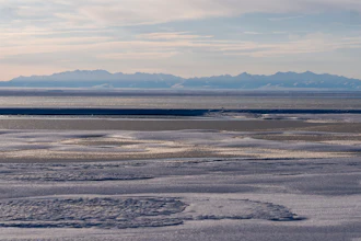 The Kaktovik Lagoon and the Brooks Range mountains of the Arctic National Wildlife Refuge are seen in the distance, Tuesday, Oct. 15, 2024, in Kaktovik, Alaska.