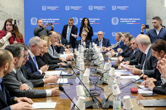 Executives from Stellantis and economic, labor and economic development ministers sit during a meeting held at the Ministry of Enterprise and Made in Italy in Rome, Tuesday, Dec. 17, 2024.