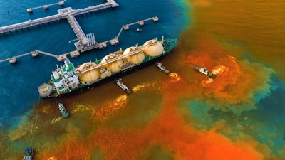 An oil spill in a body of water.