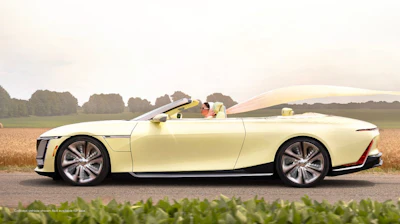 Driver side view of Cadillac SOLLEI concept vehicle in Manila Cream.