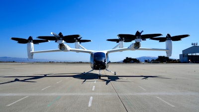 An 'electric vertical take-off and landing' aircraft built by Joby Aviation is parked at an airfield in Marina, Calif. on Monday, Oct. 7, 2024.