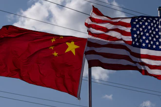 The Chinese and United States flags are flown outside the China International Supply Chain Expo in Beijing, Nov. 27, 2024.