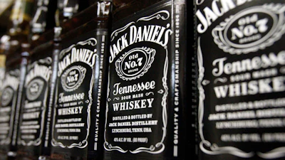 Bottles of Jack Daniel's Tennessee Whiskey line the shelves of a liquor outlet in Montpelier, Vt., Dec. 5, 2011.