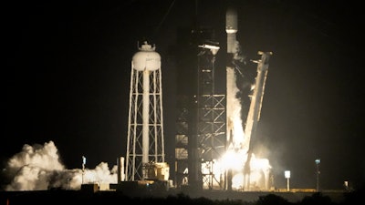 A SpaceX Falcon 9 rocket lifts off from pad 39A with a payload of a pair of lunar landers at the Kennedy Space Center in Cape Canaveral, Fla., Wednesday, Jan. 15, 2025.