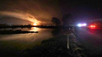 Flames and smoke from a fire fill the sky at the Moss Landing Power Plant Thursday Jan. 16, 2025 in Moss Landing, Calif.