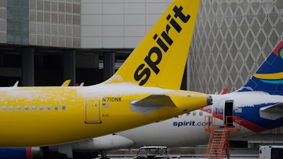 Spirit Airlines planes parked at the closed George Bush Intercontinental Airport Tuesday, Jan. 21, 2025, in Houston.