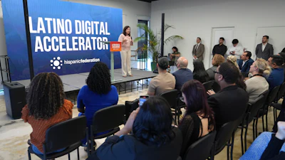 Vicky Lazo, a teacher with Southwest Miami Senior High School, speaks Tuesday, Jan. 28, 2025, in Miami during a Hispanic Federation event where they announced a new investment from Google.org to provide workforce development workshops to help Latinos learn digital skills.