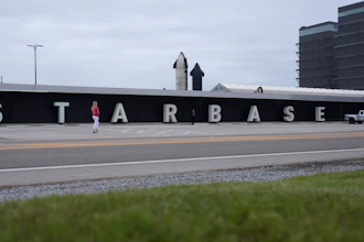 Visitors pose for photos at SpaceX's complex at Starbase in Boca Chica, Texas, Monday, Jan. 13, 2025.
