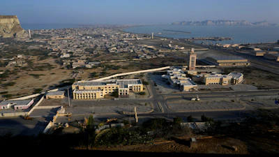 A view of newly developing area, bottom, and downtown area seen from a hilltop in the coastal city of Gwadar, in the southwest Pakistani province of Balochistan, Jan. 14, 2025.