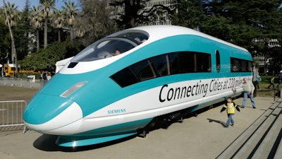 A full-scale mock-up of a high-speed train, is displayed at the Capitol in Sacramento, Calif., on Feb. 26, 2015.