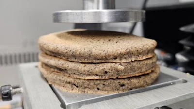 WSU scientists used different lab equipment, like this one that evaluates texture, to measure the impact of using different ratios of whole wheat flours in pancakes.