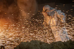 A worker in protective clothes melts steel at the Zaporizhstal Iron and Steelworks, one of the country's largest steel plants, in Zaporizhzhia, Ukraine, Thursday, Feb. 13, 2025.