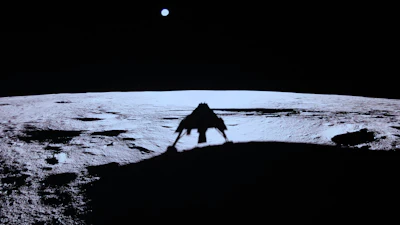Private lunar lander Blue Ghost's shadow is seen on the moon's surface after touching down on the moon with a special delivery for NASA, Sunday, March 2, 2025.