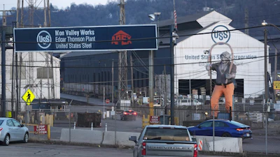 Cars sit parked outside the United States Steel Corporations Edgar Thomson Plant in Braddock, Pa., on Tuesday, March 4, 2025, in Braddock, Pa.