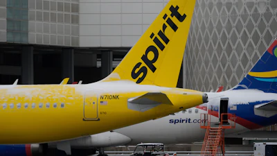 Spirit Airlines planes parked at the closed George Bush Intercontinental Airport, Jan. 21, 2025, in Houston.