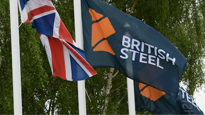 A flag with a British Steel logo at the entrance to the steelworks plant in Scunthorpe, England, June 1, 2016.