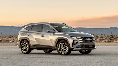 This photo provided by Hyundai shows the Tucson Plug-in Hybrid. This plug-in version of Hyundai's small crossover SUV can drive an estimated 32 miles on electric power before switching to gas and getting 35 mpg.