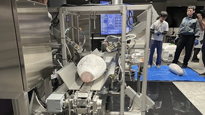 Tuna goes into Sonofai at a Fujitsu facility in Kawasaki, Japan, April 9, 2025.