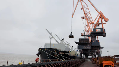 Coking coal is unloaded at Immingham Port, northern England, Tuesday, April 15, 2025.