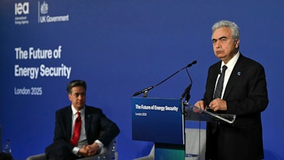 Britain's Secretary for Energy Security Ed Miliband looks on as Fatih Birol, Executive Director of the International Energy Agency (IEA) speaks on day one of the International Summit on the Future of Energy Security at Lancaster House in London, Thursday April 24, 2025.