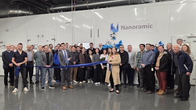 The Nanoramic team celebrates its new facility opening with a ribbon cutting ceremony.
