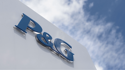 This July 9, 2015, file photo, shows signage outside Procter & Gamble corporate headquarters in downtown Cincinnati.