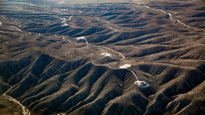 This aerial photo taken on Nov. 13, 2023, by Archaeology Southwest with a volunteer pilot and Lighthawk, a nonprofit organization, shows access roads and tower pad sites west of the San Pedro River, near Redrock Canyon, in Arizona.
