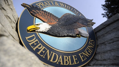 This file photo taken Feb. 5, 2010, shows a 'Pratt & Whitney Dependable Engines' emblem at the plant in East Hartford, Conn.