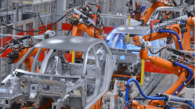 Robotic welding as part of the automotive assembly process.