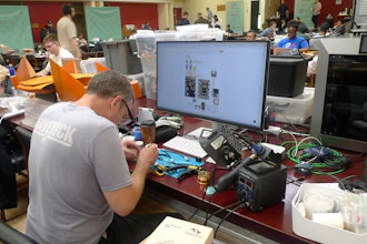 Participants gather for the London Defence Tech Hackathon, a weekend brainstorming solution for technical challenges, at the Royal Military Academy Sandhurst in Camberley, England, May 10, 2025.