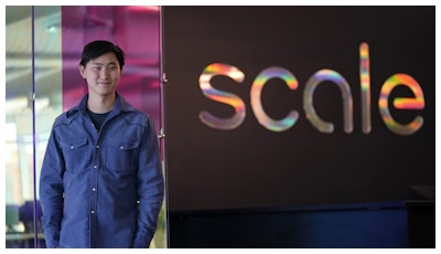Scale AI founder and CEO Alexandr Wang poses for photos at the company's office in San Francisco, May 15, 2023.