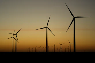 Wind turbines stretch across the horizon at dusk at the Spearville Wind Farm, Sept. 29, 2024, near Spearville, Kan.