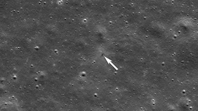 This image provided by NASA shows an annotation indicating the impact site for ispace's Resilience lunar lander, seen by the Lunar Reconnaissance Orbiter Camera on June 11, 2025.
