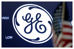 In this June 26, 2018, file photo the General Electric logo appears above a trading post on the floor of the New York Stock Exchange.