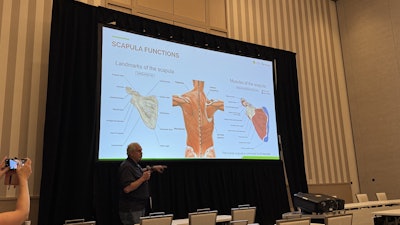 PTC's Principal CAD Solution Consultant, Lee Goodwin, showing a presentation of scapula functions.