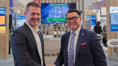 AMI Metals President Bernie Rees and Commerce Director Joe Nguyen celebrate AMI’s expanded footprint in Spokane County.