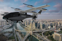 A computer-generated image shows a Revo eVTOL flying over São Paulo.