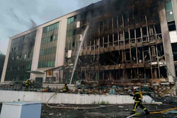 Rescue workers put out a fire of a building damaged by a Russian drone strike on Kyiv, Ukraine, Tuesday, June 10, 2025.