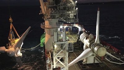 In this October 2018 photo provided by MeyGen, tidal turbines are visible at the MeyGen tidal site located in the Inner Sound of the Pentland Firth, a narrow channel of water between the Scottish mainland and Stroma Island.