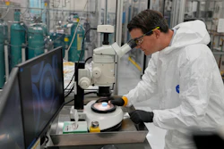 Taylor Duffin, of TRISO-X, a subsidiary of X-Energy, looks at a sample of TRISO fuel through a microscope Friday, June 27, 2025, in Oak Ridge, Tenn.