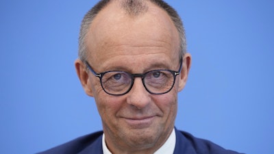 German Chancellor Friedrich Merz attends the annual press conference at the Federal Press Conference in Berlin, Germany, Friday, July 18, 2025.