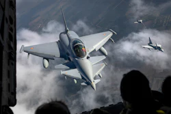Spanish Air Force Eurofighter Typhoon military fighter jets, left, and Italian Air Force Eurofighter Typhoon military fighter jets, right, participating in NATO's Baltic Air Policing Mission operate in Lithuanian airspace,, Sept.12, 2023.