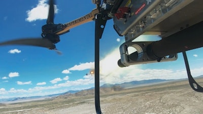 Drone firing missiles in BAE Systems testing.