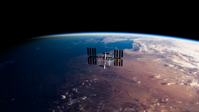 International Space Station orbiting above Earth.