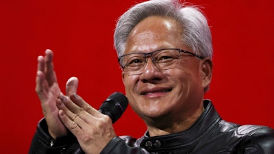 Nvidia CEO Jensen Huang attends a round table discussion at the VivaTech fair dedicated to innovation and startups in Paris, Wednesday, June 11, 2025.