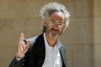 In this Wednesday, May 15, 2019, file photo, Palantir CEO Alex Karp arrives for the Tech for Good summit in Paris.